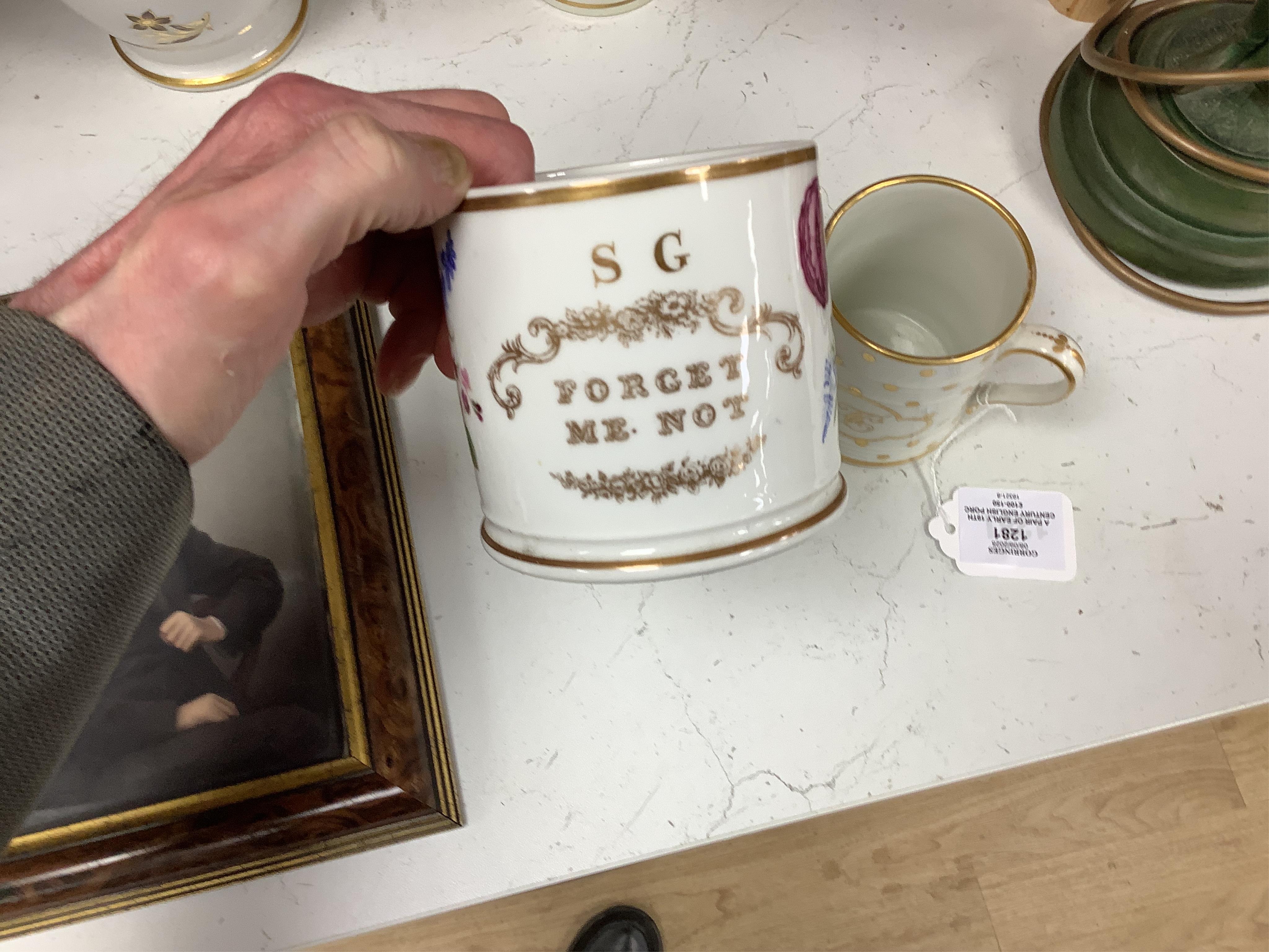 A pair of early 19th century English porcelain large mugs with gilt bands and five other early 19th century porcelain or pearlware mugs, one inscribed SG, Forget Me Not, largest each 14cm high
